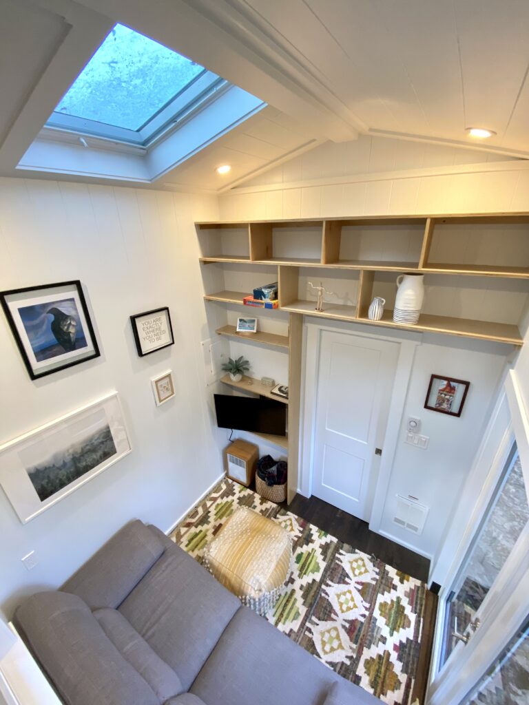 Tiny home requiring stair cabinetry, storage couch and living room shelving.
